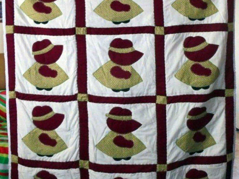 #1010  Maroon Sun Bonnet Sue