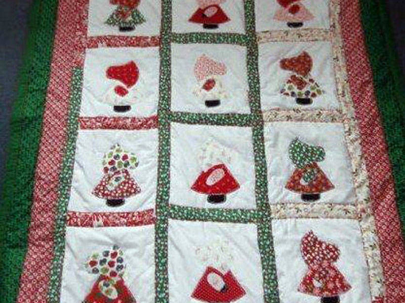 #934  Small Throw, Christmas Sun bonnet Sue